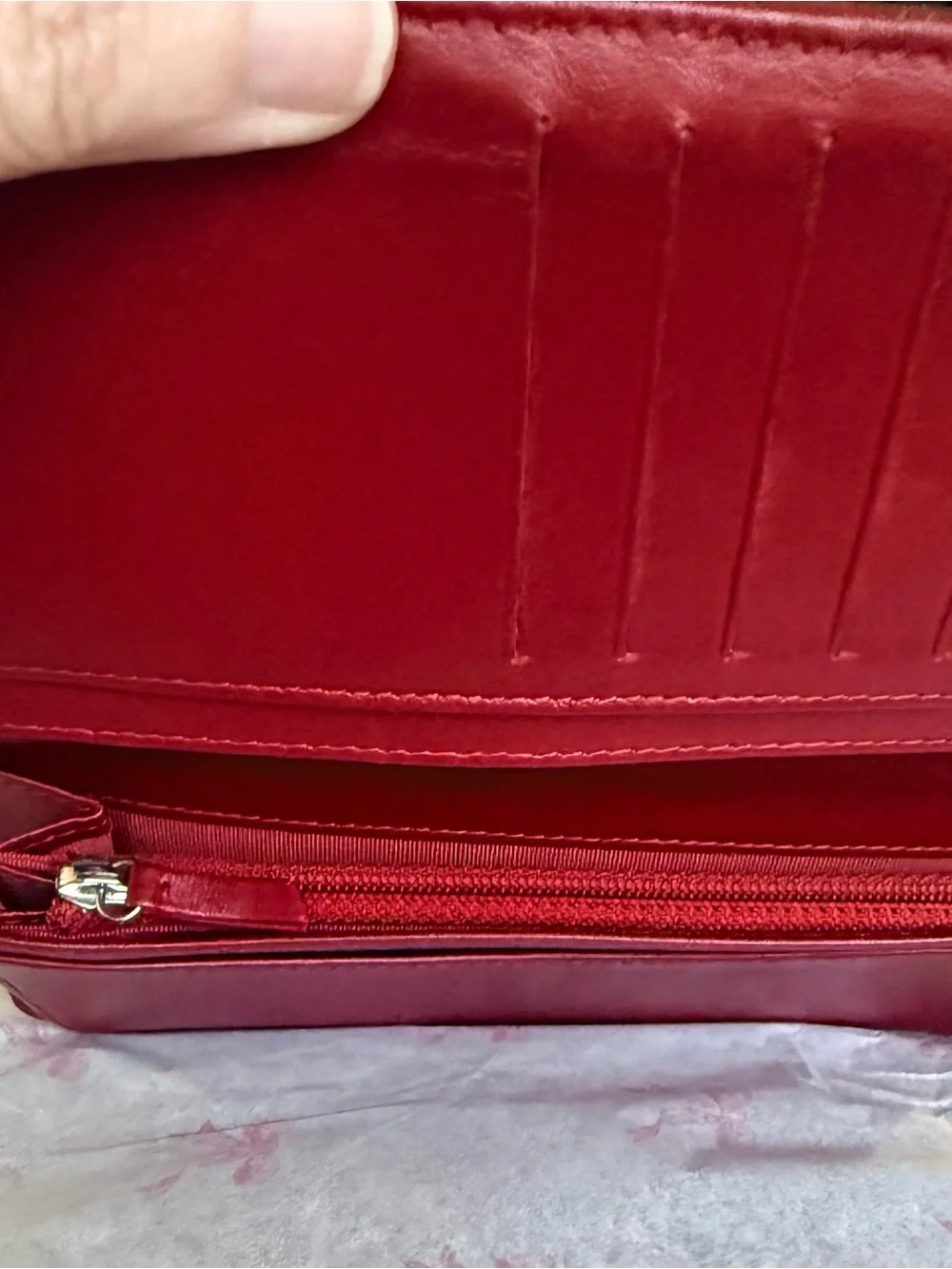 Authentic CHANEL Quilted Red Lambskin Leather Long Wallet with Silver CC Emblem.